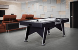 The Windchill table staged in a contemporary home game room with clean lighting—ideal for family competition or casual matches with friends.