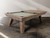 Desyn Slate Pool Table in Antique with the optional 4-piece dining top partially installed. The image shows how the table converts for multipurpose use while retaining its rustic modern appeal.