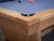 Close-up of corner pocket on the Doc & Holliday Kaci Slate Pool Table with Academy Blue felt and Doc & Holliday luxury billiard balls.