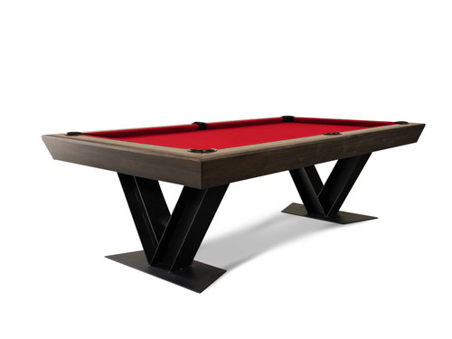 Doc & Holliday Savant Slate Pool Table in Brown Sugar finish with sleek matte black V-shaped legs shown in a modern lifestyle interior. This 3/4 angle view highlights the contemporary profile and industrial design, making it a statement piece for designer homes and luxury game rooms.