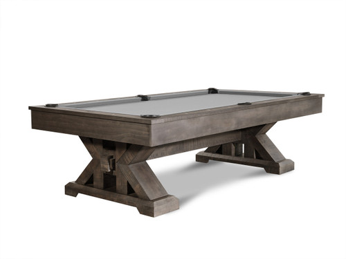 The Jasper Slate Pool Table by Nixon Billiards in a weathered slate finish, shown in a stunning ¾ view against a minimalist concrete floor. The rustic farmhouse design and solid wood craftsmanship make this pool table a standout piece in any modern or rustic game room. Built for high-performance play and elegant design, the Jasper is the perfect addition to your entertainment space.