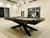 Plank & Hide Felix 8' Steel Slate Pool Table set up in a luxurious home game room, showcasing its modern industrial design and sleek gunmetal finish in a stylish, sophisticated space.