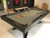 High-quality 1” three-piece slate playing surface of the Plank & Hide Felix Steel Slate Pool Table, ensuring professional-grade ball movement and flawless gameplay.