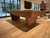 The Preakness Slate Pool Table by Doc & Holliday is shown in a striking ¾ angle on a white background—sleek, grounded, and built like a thoroughbred in full stride. Rounded corners soften its bold silhouette, while the sculpted pedestal legs command attention without overwhelming the room. This is a table with presence—made for homes where design leads and details matter. Available exclusively through Sawyer Twain, the Preakness brings the spirit of the racetrack into the luxury game room.