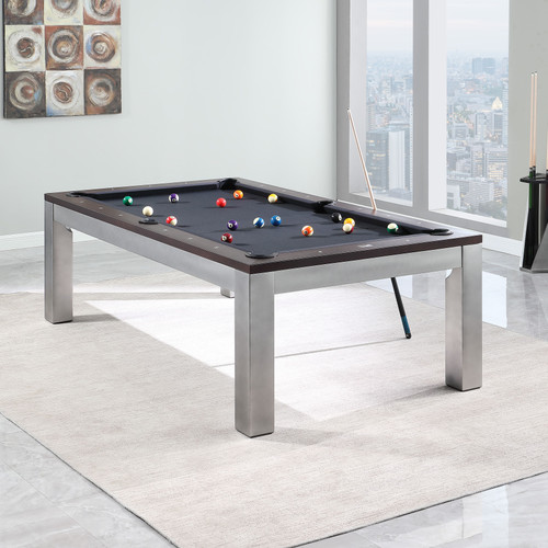 The Playcraft Genoa Slate Pool Table in Walnut on Silver shown in a minimalist open-concept living space, with modern lighting and sleek décor. This image highlights the clean Parsons-style frame and smooth slate playfield, reinforcing Sawyer Twain's curated lineup of design-forward, furniture-grade game tables.