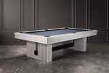 The Vancouver Slate Pool Table in White Wash, exclusively from American Heritage Billiards and Sawyer Twain, anchors this modern interior with effortless confidence. Shown without the dining top, it reveals the premium playing surface and distinctive reeded base—built to make a statement in high-end homes.