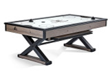 A wide-angle image of the Brunswick Premier Air Hockey Table showcasing its industrial-chic design. The metal “X” frame base supports a sleek playfield in a weathered oak finish, creating a bold centerpiece for any game room. Dual abacus scorers and the commercial-grade blower motor hint at the table’s fast-paced gameplay.