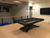 Professional White Glove delivery and installation service for the Plank & Hide Felix Steel Slate Pool Table, ensuring meticulous handling and expert setup for your game room.