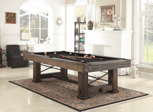 The Rio Grande shown in a styled modern-rustic game room, with natural lighting and industrial fixtures highlighting the Weathered Bark tones.